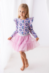 Dívčí blůzka s barevným donutovým potiskem a volánkovými rukávy Dívčí blůzka s barevným donutovým potiskem a volánkovými rukávy